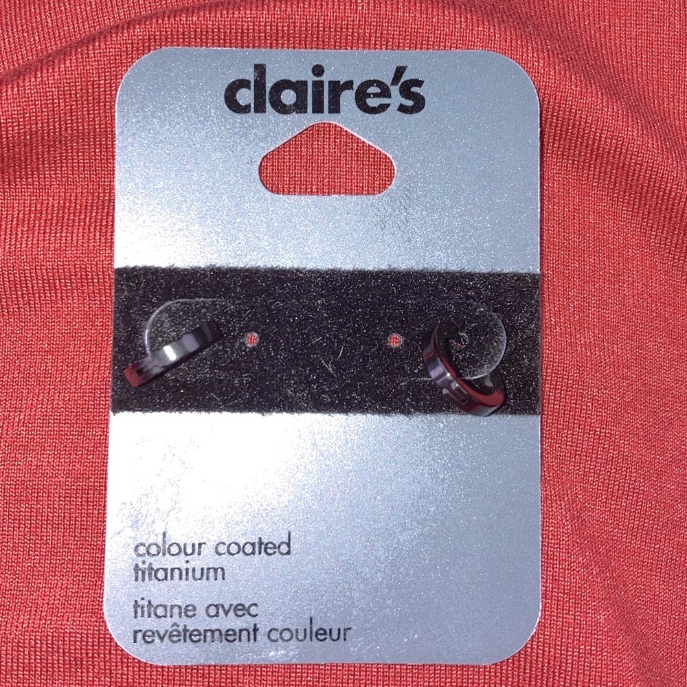 Claire’s titanium small black hoops